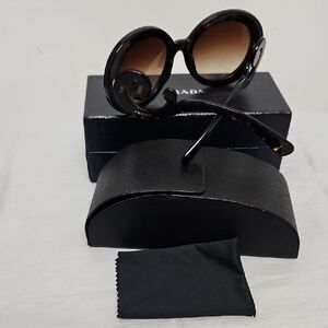 Prada Women’s Tortoise Round Sunglasses with Gradient Brown Lenses
